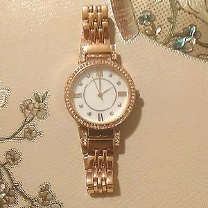 Golden Watch With Roman Numerals